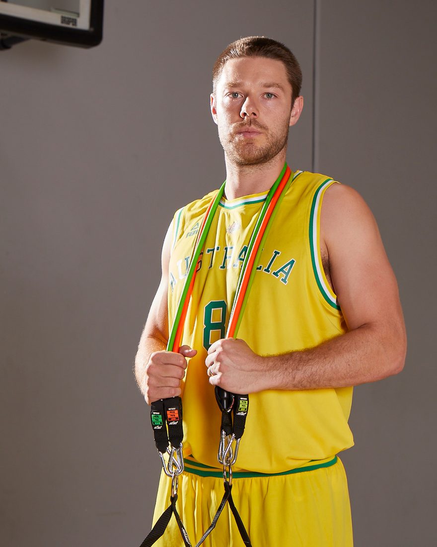Matthew Dellavedova in the Australian Boomers singlet with PTP resistance tubes around his neck